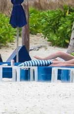 CATHERINE ZETA JONES in Swimsuit on the Beach in Cancun 03/23/2016