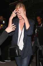 CHARLIZE THERON Arrives at Craig