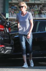 CHARLIZE THERON Out and About in Hollywood 02/29/2016