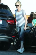 CHARLIZE THERON Out and About in Hollywood 02/29/2016