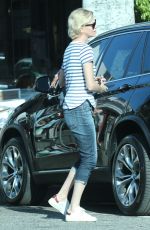 CHARLIZE THERON Out and About in Hollywood 02/29/2016