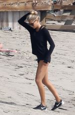 CHARLOTTE MCKINNEY Working Out at a Beach in Malibu 02/28/2016