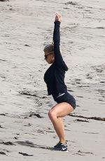 CHARLOTTE MCKINNEY Working Out at a Beach in Malibu 02/28/2016