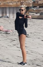 CHARLOTTE MCKINNEY Working Out at a Beach in Malibu 02/28/2016