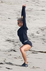 CHARLOTTE MCKINNEY Working Out at a Beach in Malibu 02/28/2016