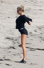 CHARLOTTE MCKINNEY Working Out at a Beach in Malibu 02/28/2016