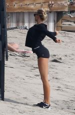 CHARLOTTE MCKINNEY Working Out at a Beach in Malibu 02/28/2016