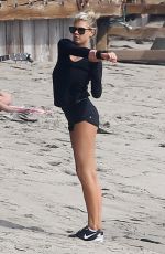 CHARLOTTE MCKINNEY Working Out at a Beach in Malibu 02/28/2016