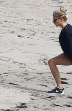 CHARLOTTE MCKINNEY Working Out at a Beach in Malibu 02/28/2016