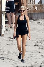 CHARLOTTE MCKINNEY Working Out at a Beach in Malibu 02/28/2016
