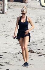 CHARLOTTE MCKINNEY Working Out at a Beach in Malibu 02/28/2016