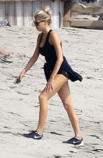 CHARLOTTE MCKINNEY Working Out at a Beach in Malibu 02/28/2016