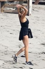 CHARLOTTE MCKINNEY Working Out at a Beach in Malibu 02/28/2016