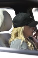 CHLOE MORETZ Chats on Her Phone Near Her Home in Los Angeles 03/22/2016
