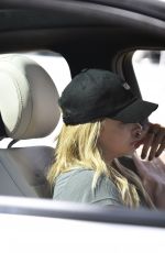 CHLOE MORETZ Chats on Her Phone Near Her Home in Los Angeles 03/22/2016