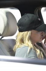 CHLOE MORETZ Chats on Her Phone Near Her Home in Los Angeles 03/22/2016