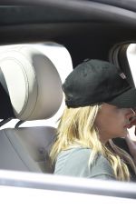 CHLOE MORETZ Chats on Her Phone Near Her Home in Los Angeles 03/22/2016