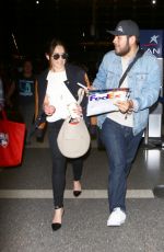 EMILIA CLARKE at LAX Airport in Los Angeles 02/29/2016