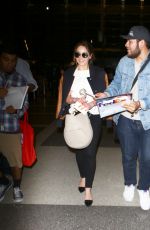 EMILIA CLARKE at LAX Airport in Los Angeles 02/29/2016