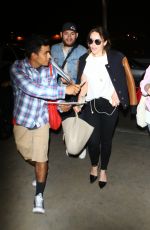 EMILIA CLARKE at LAX Airport in Los Angeles 02/29/2016
