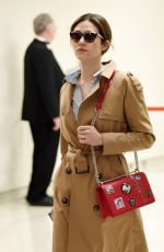 EMMY ROSSUM at LAX Airport in Los Angeles 03/21/2016
