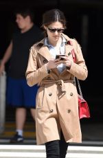 EMMY ROSSUM at LAX Airport in Los Angeles 03/21/2016