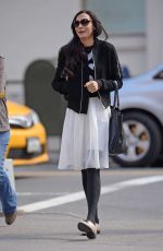 FAMKE JANSEN Walks Her Dog in New York 03/18/2016