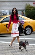 FAMKE JANSSEN Walks Her Dog Out in New York 03/11/2016