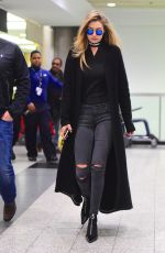 GIGI HADID Arrives at JFK Airport in New York 03/24/2016