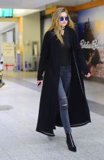 GIGI HADID Arrives at JFK Airport in New York 03/24/2016