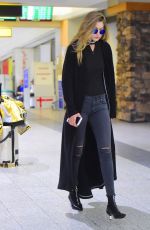 GIGI HADID Arrives at JFK Airport in New York 03/24/2016