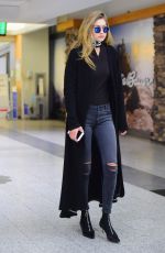 GIGI HADID Arrives at JFK Airport in New York 03/24/2016