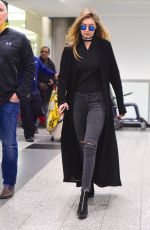 GIGI HADID Arrives at JFK Airport in New York 03/24/2016