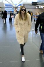 GIGI HADID at JFK Airport in New York 03/18/2016