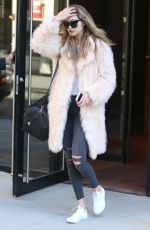 GIGI HADID Leaves Her Hotel in New York 03/18/2016