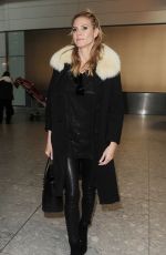 HEIDI KLUM at Heathrow Airport in London 03/13/2016