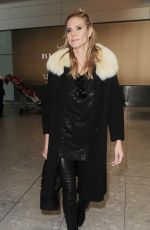 HEIDI KLUM at Heathrow Airport in London 03/13/2016