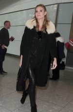HEIDI KLUM at Heathrow Airport in London 03/13/2016