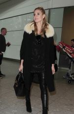 HEIDI KLUM at Heathrow Airport in London 03/13/2016
