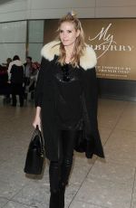 HEIDI KLUM at Heathrow Airport in London 03/13/2016