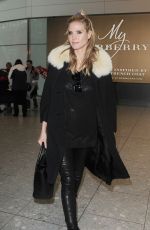 HEIDI KLUM at Heathrow Airport in London 03/13/2016