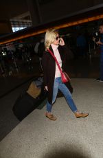 JANUARY JONES at LAX Airport in Los Angeles 03/06/2016