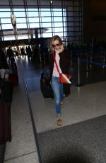 JANUARY JONES at LAX Airport in Los Angeles 03/06/2016