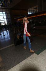 JANUARY JONES at LAX Airport in Los Angeles 03/06/2016