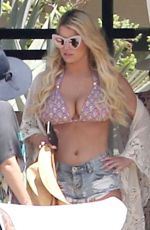 JESSICA SIMPSON in Bikini Top and Daisy Dukes at a Hotel in Cabo San Lucas 03/30/2016