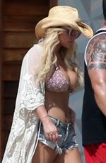 JESSICA SIMPSON in Bikini Top and Daisy Dukes at a Hotel in Cabo San Lucas 03/30/2016