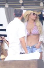 JESSICA SIMPSON in Bikini Top and Daisy Dukes at a Hotel in Cabo San Lucas 03/30/2016