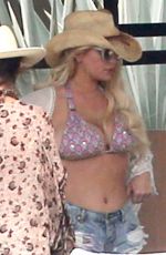 JESSICA SIMPSON in Bikini Top and Daisy Dukes at a Hotel in Cabo San Lucas 03/30/2016