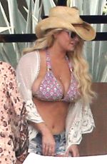 JESSICA SIMPSON in Bikini Top and Daisy Dukes at a Hotel in Cabo San Lucas 03/30/2016