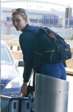 KARLIE KLOSS at Newark Internatinal Airport 03/18/2016